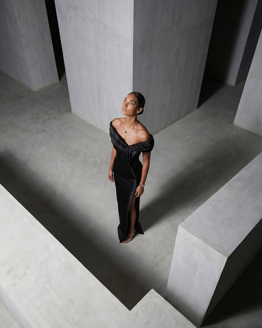 Noir Pleated Off-Shoulder Column Gown with Slit